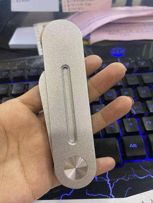I-Tesla MagSafe Laptop nendawo Yokubeka Ifoni Ehlanzekile